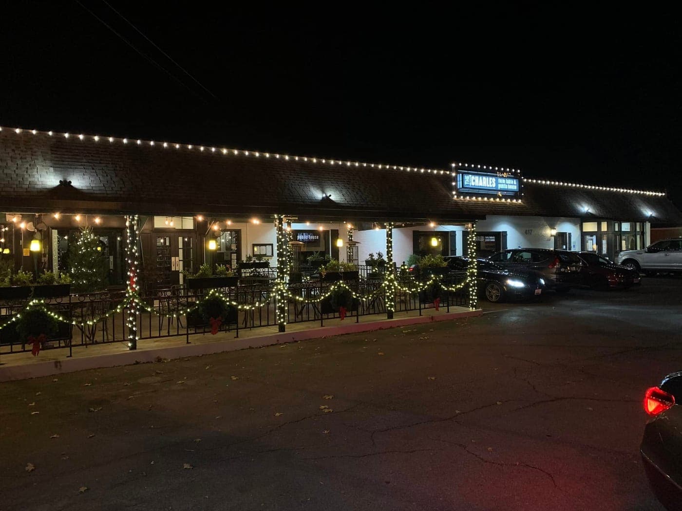 Commercial holiday lighting and garland on a Southern Maryland business